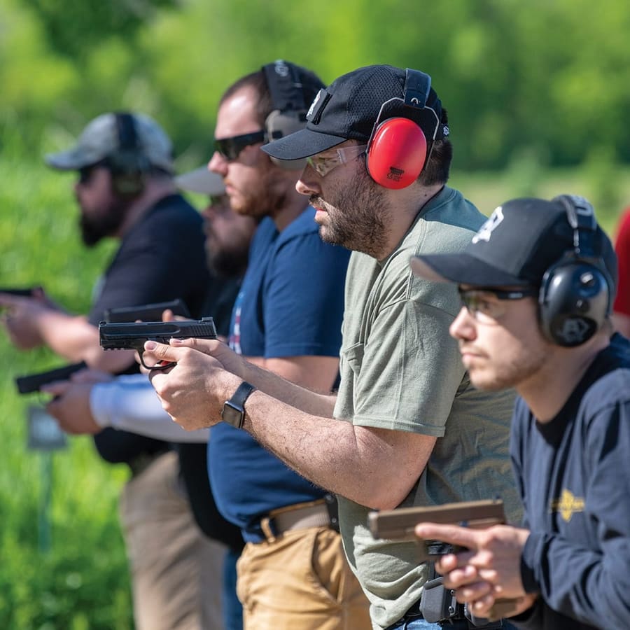 Shooting Solutions students on the range